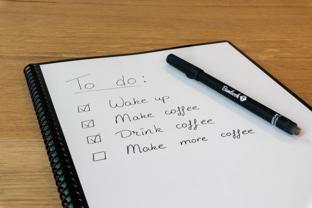 A to-do list with pen and paper