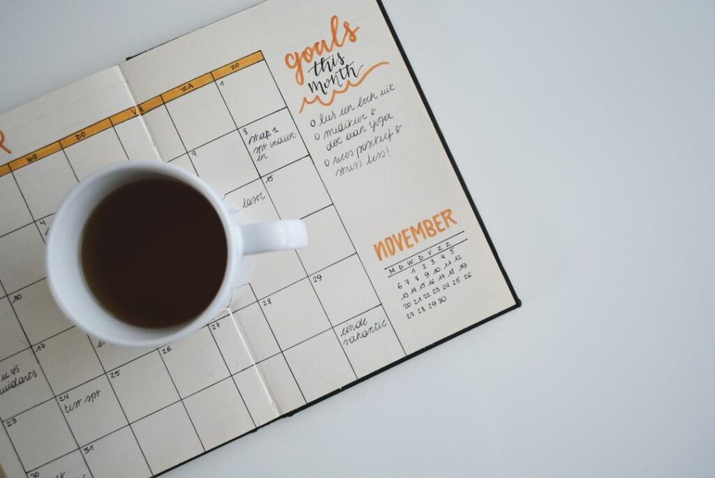 Filled-in calendar with a cup of coffee.